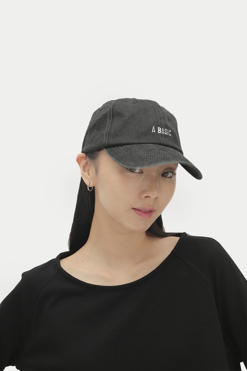 A BASIC Cap in Washed Black | Basic Models: Singapore Modelling Agency